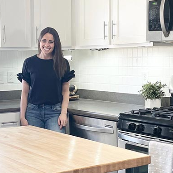 woman-standing-in-remodeled-kitchen